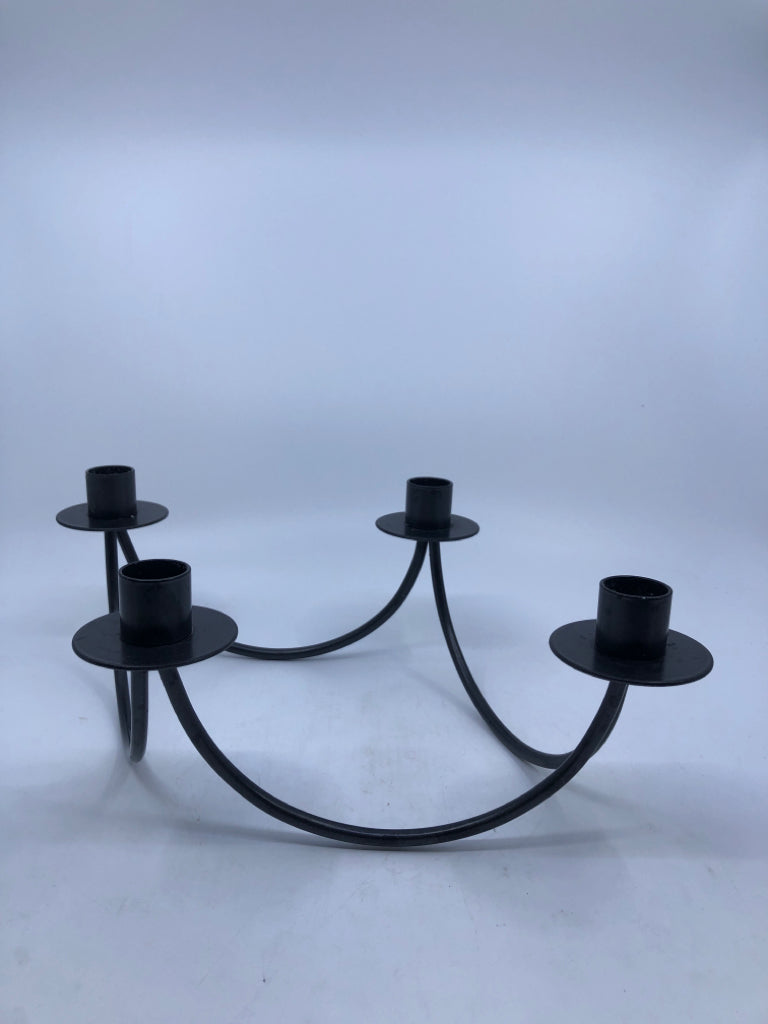 METAL 4 CANDLE HOLDER.