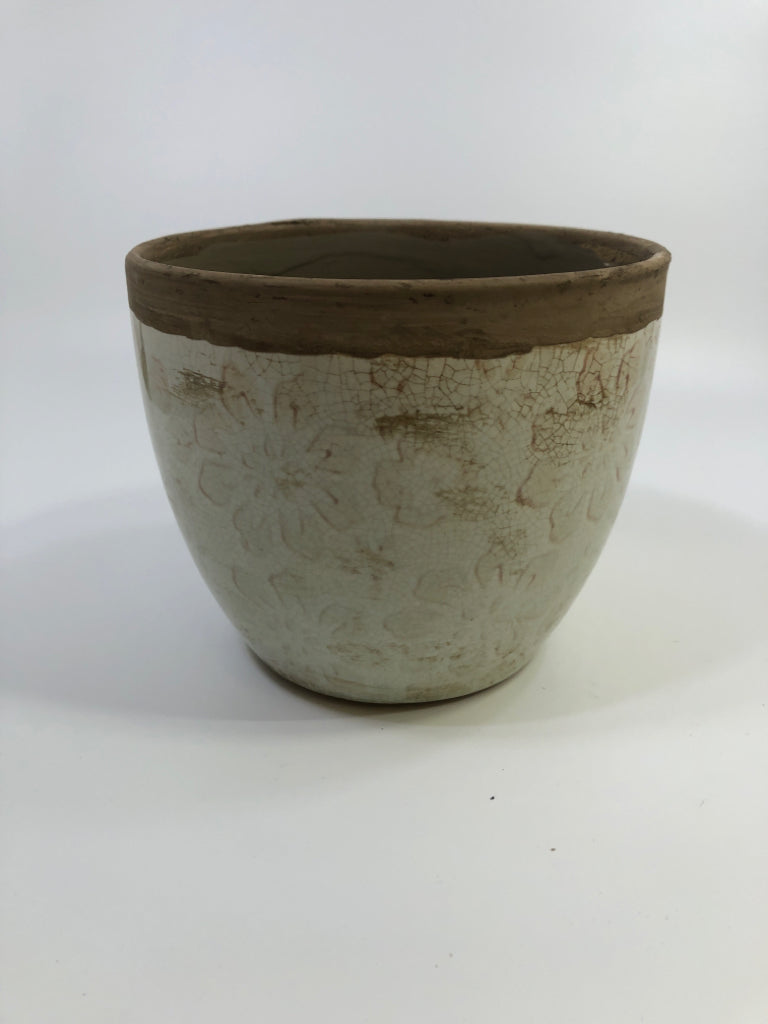 CREAM CRACKLE PLANTER W/FLOWER PATTERN BROWN EDGE.
