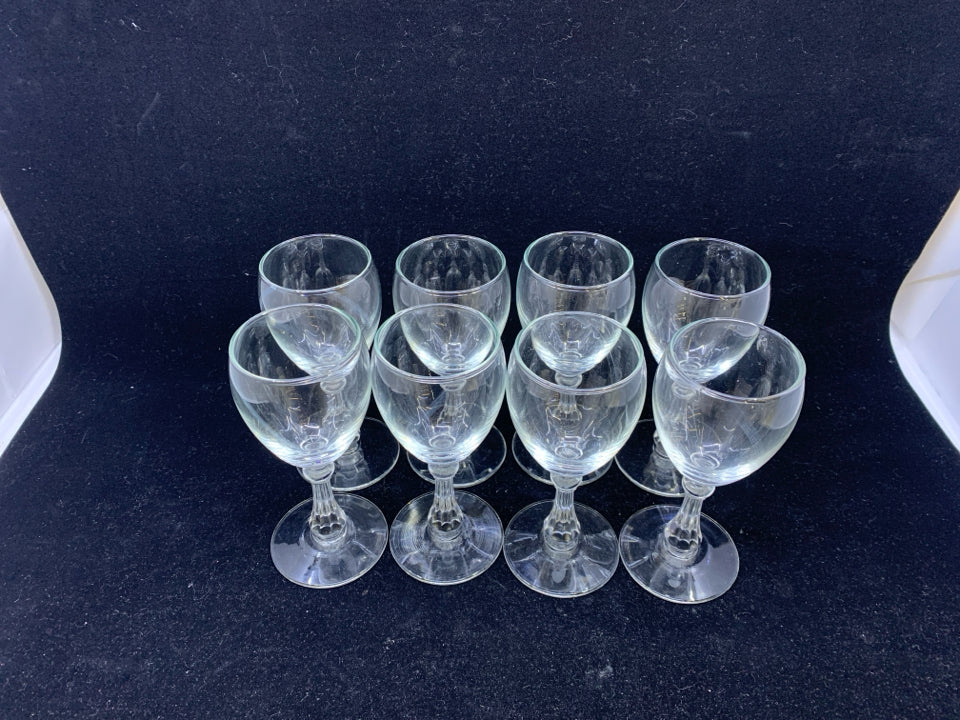 8 FOOTED WINE GLASSES.