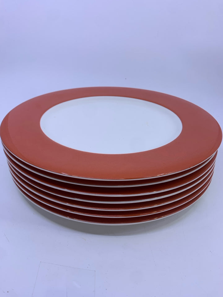 7 BURNT ORANGE CRATE AND BARREL DINNER PLATES.