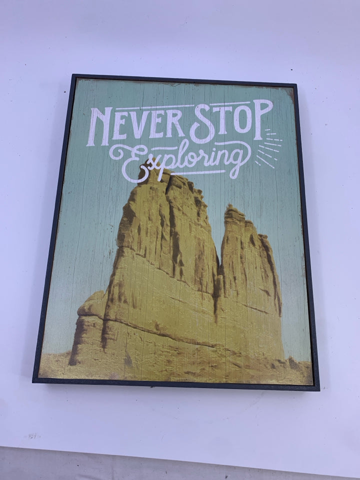 NEVER STOP EXPLORING WALL HANGING.