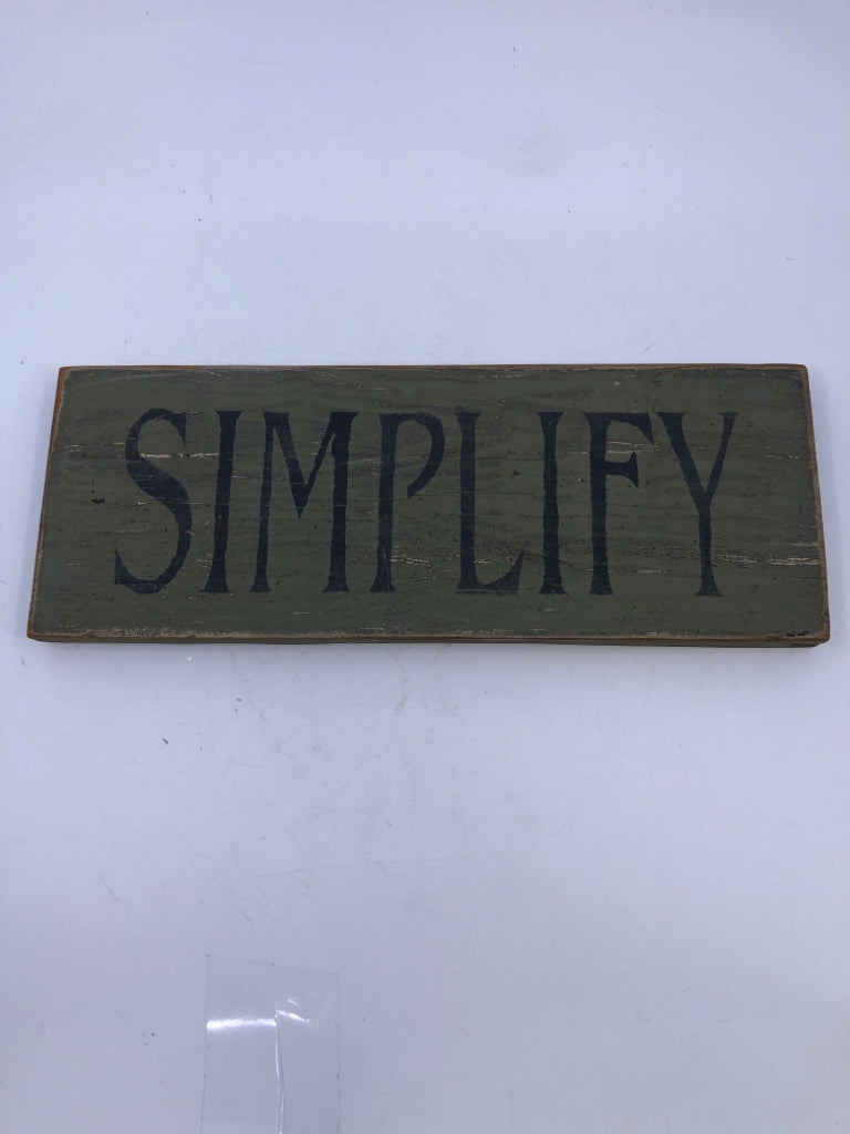 DISTRESSED SIMPLIFY PAINTED GREEN SIGN.