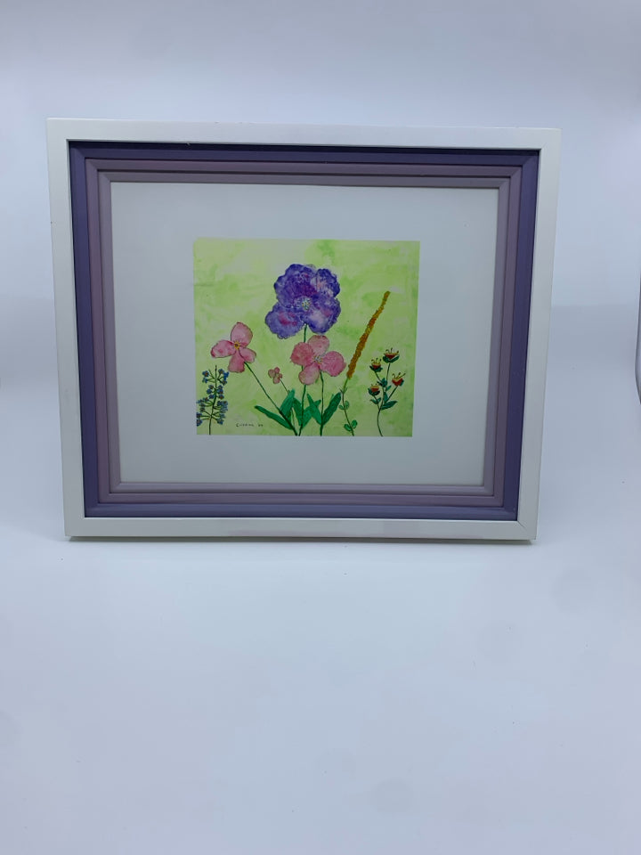 PURPLE AND PINK DRAWING IN WHITE FRAME.