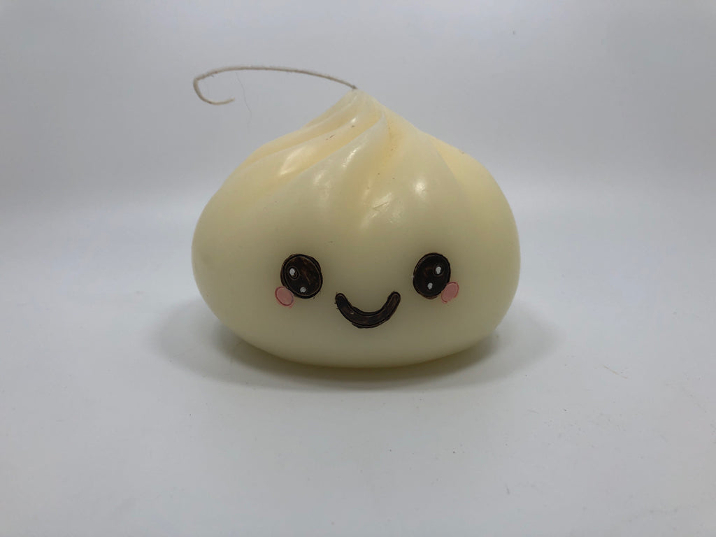 WHITE CANDY DROP W/FACE CANDLE.