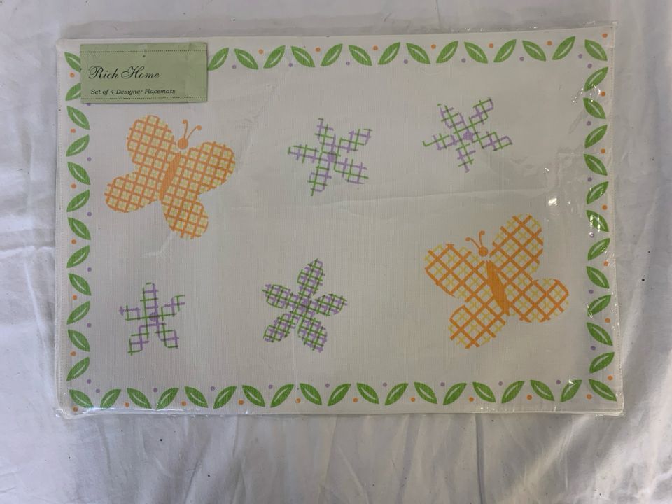 4 NIP PLACE MATS W/ PLAID FLOWERS + BUTTERFLIES.