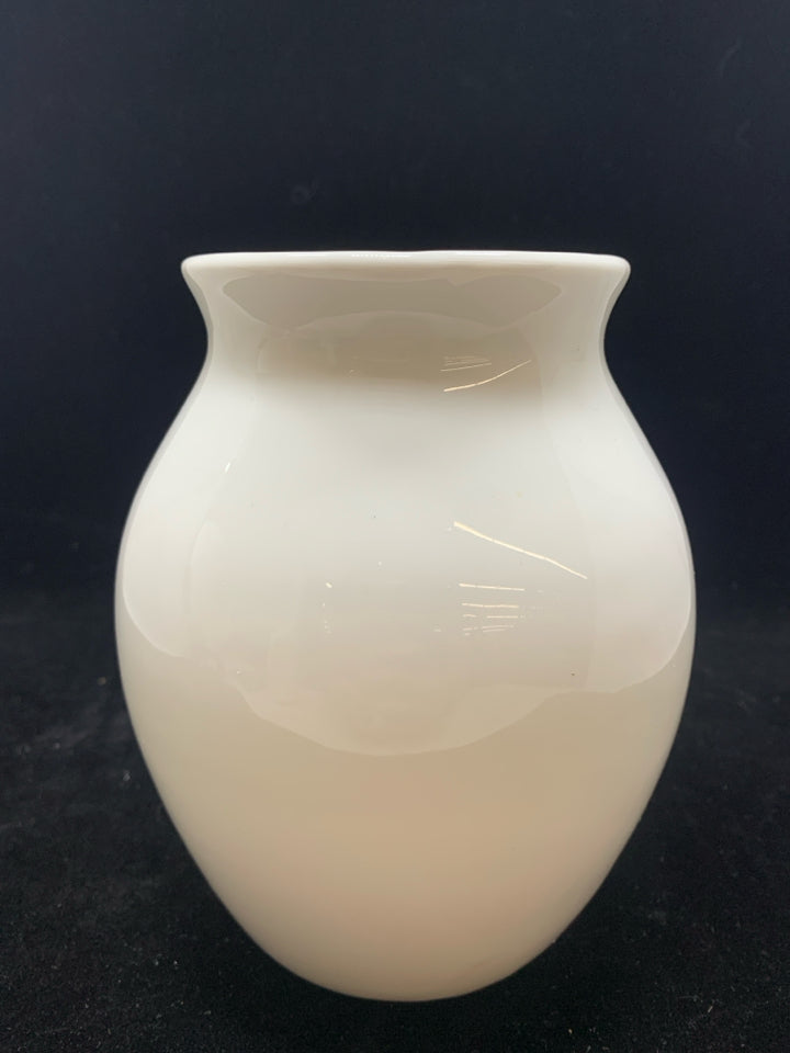 WHITE CERAMIC VASE.