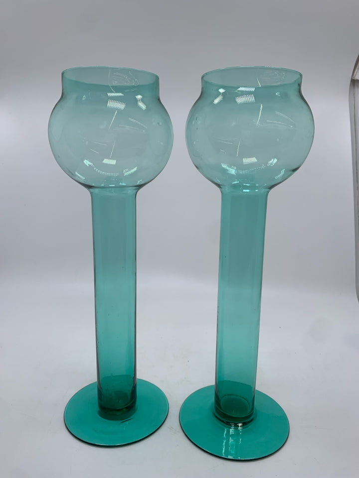 2 GLASS FLOATING CANDLESTICKS.