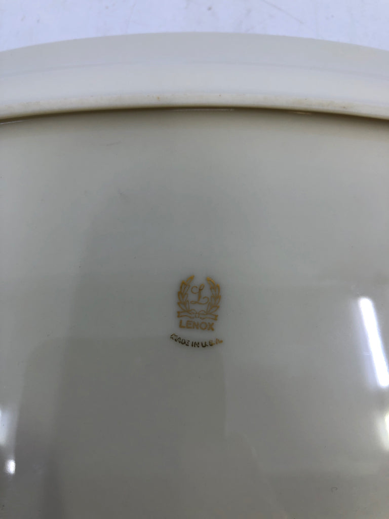 OVAL BASKET WEAVE DISH W/ SILVER EDGE.