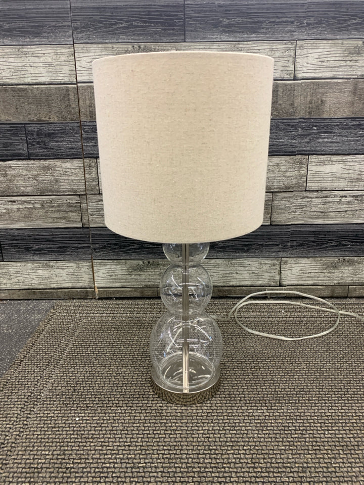 GLASS BUBBLE BASE LAMP W/ CANVAS SHADE.