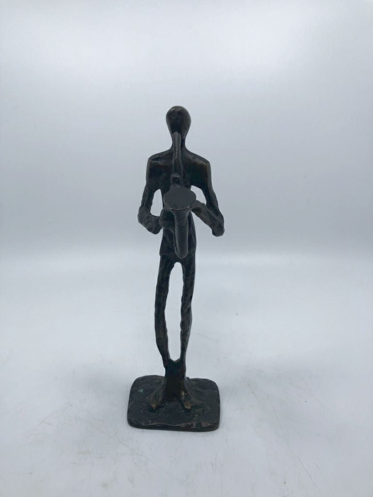 BRONZE SAXOPHONE PLAYING FIGURINE.