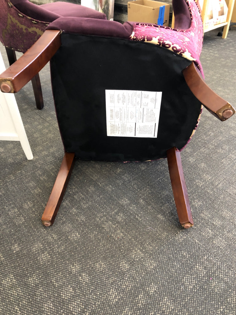 2 MAROON SUEDED CHAIRS W/PAISLEY DESIGN ON BACK & WOOD LEGS.