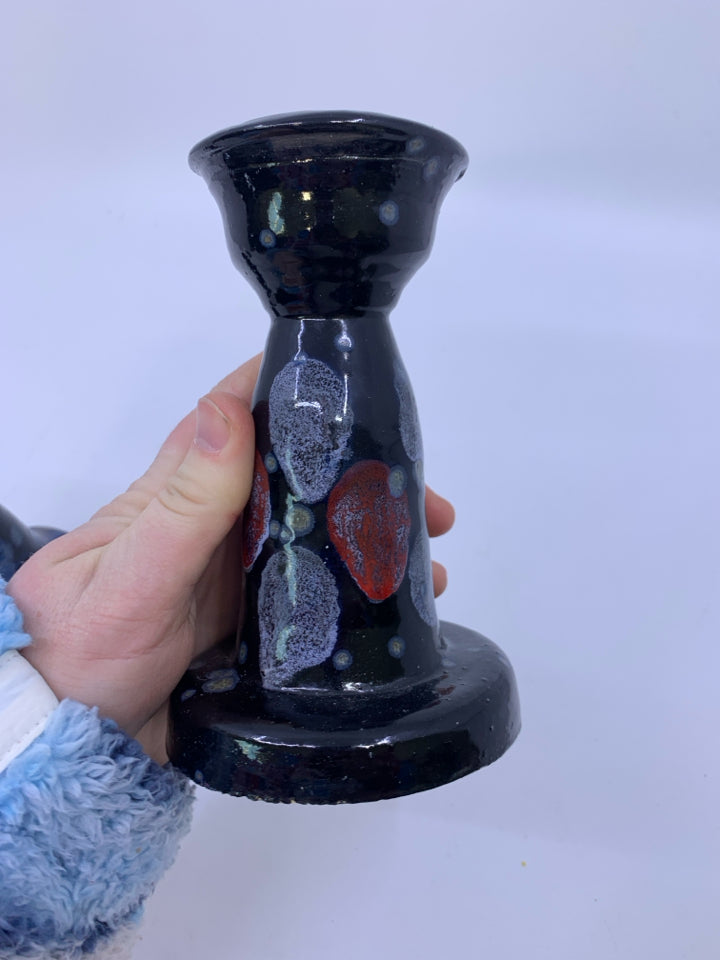 2PC POTTERY CANDLE HOLDER SET.