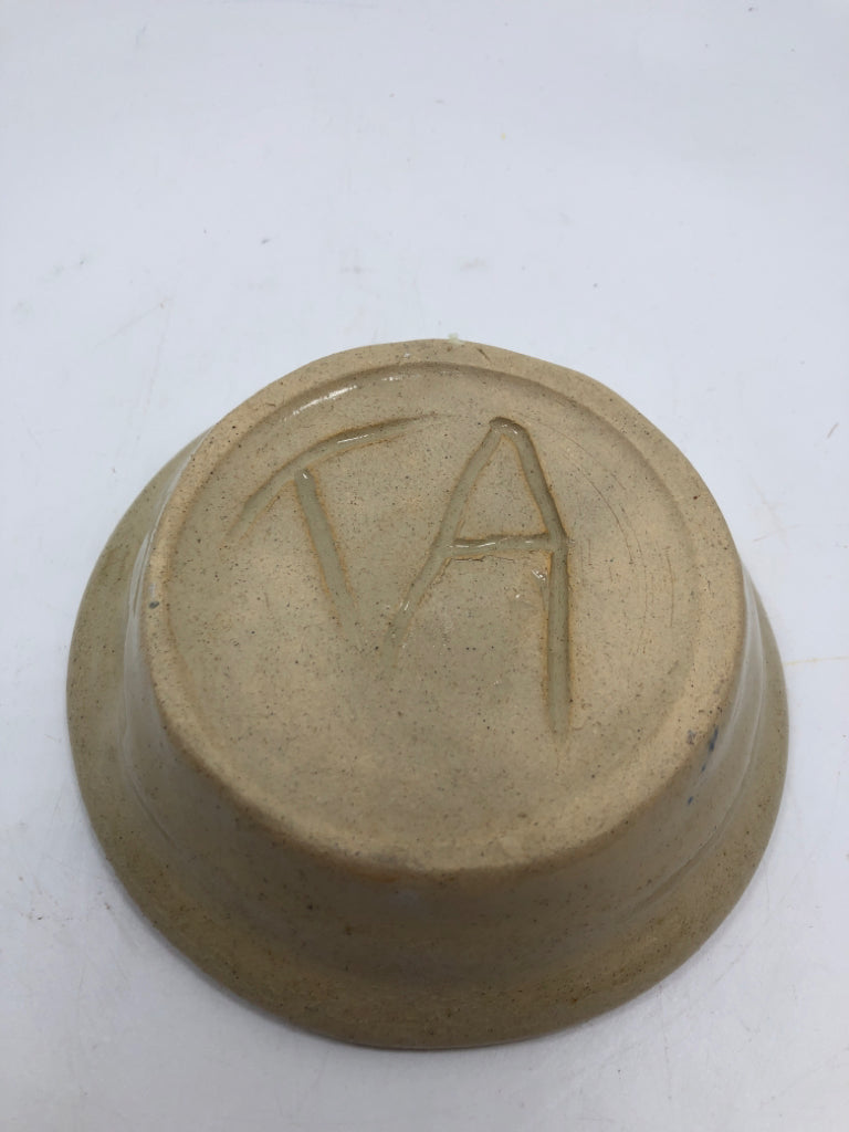 TAN AND GREEN GLAZE POTTERY DISH.