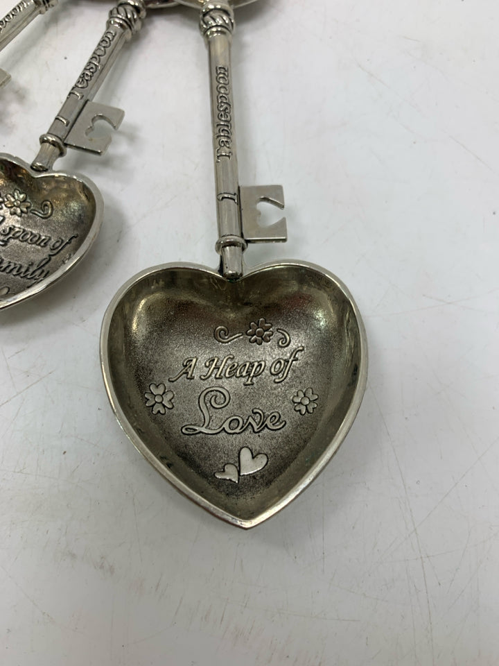 4 VTG METAL HEART SHAPED TEASPOONS.