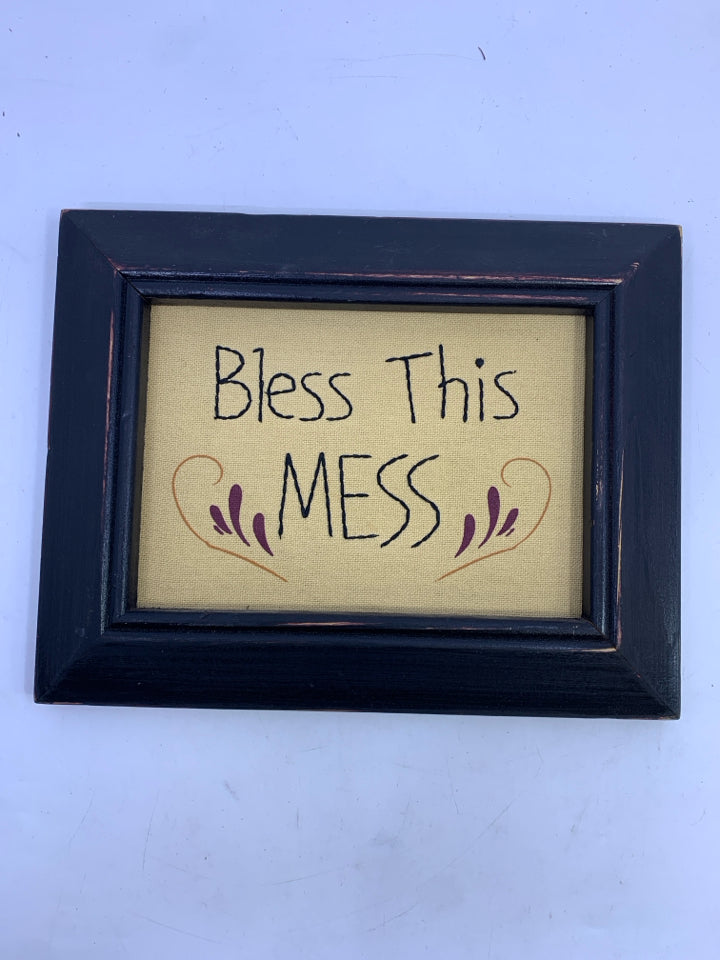 PRIMITIVE "BLESS THIS MESS" BLACK FRAME WALL HANGING.