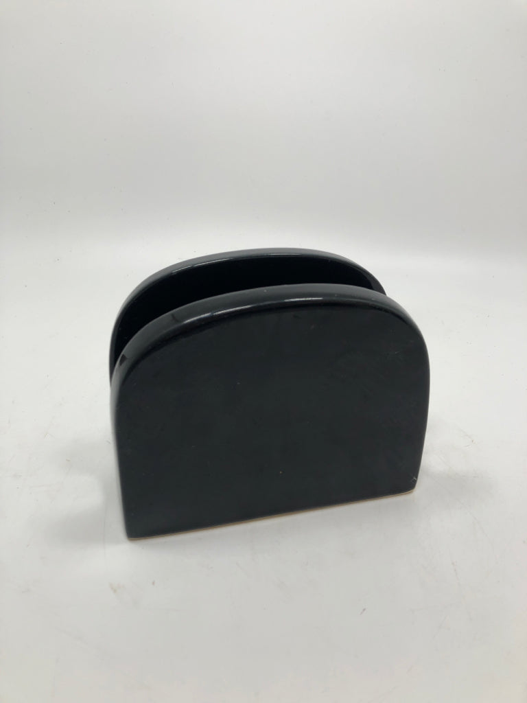 BLACK CERAMIC NAPKIN HOLDER.