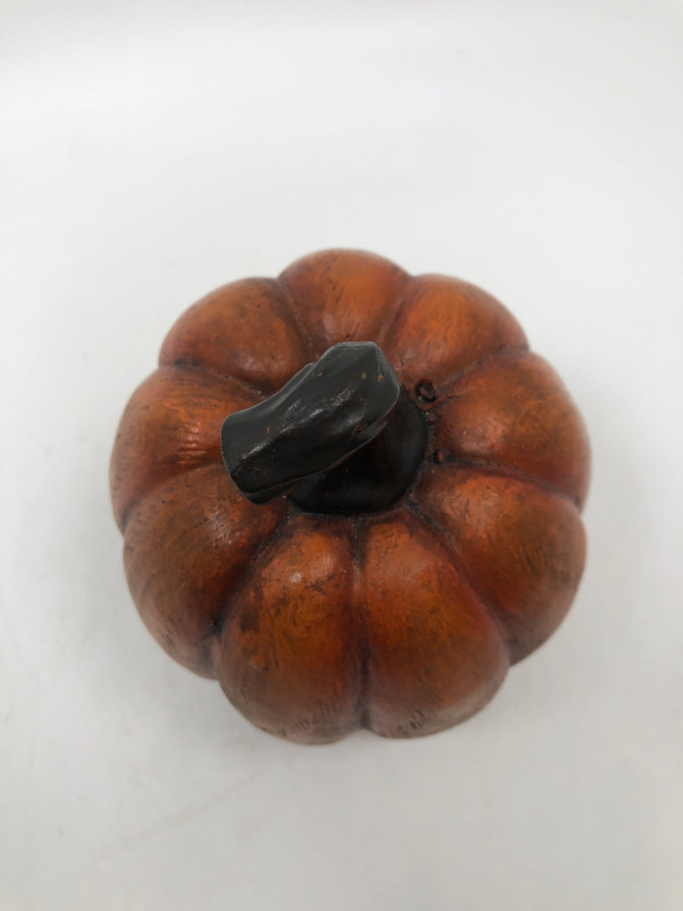 ORANGE PAINTED RESIN PUMPKIN.