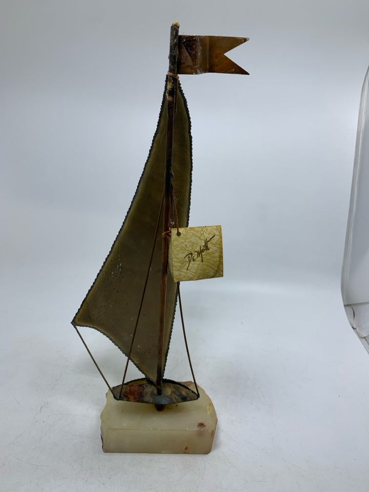 VTG BRASS SAIL BOAT ON ROCK SLAB SIGNED DEMOTT W/ TAGS.
