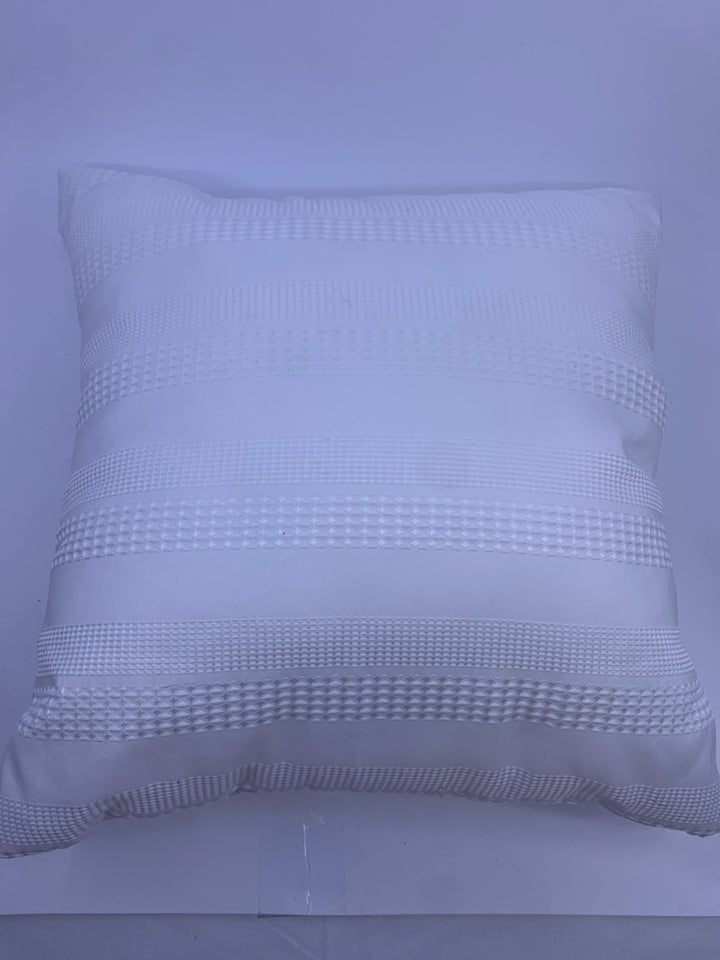 WHITE ACCENT PILLOW DIAMOND DESIGN.