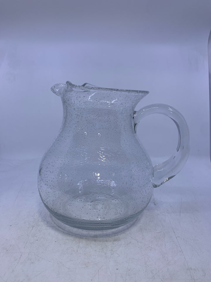 BUBBLE GLASS PITCHER WITH ICE LIP.