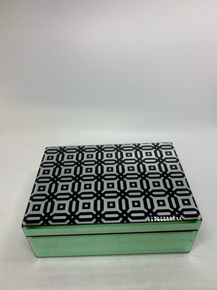 GLASS MIRRORED BOX W/ BLACK GEOMETRIC PATTERNED TOP.