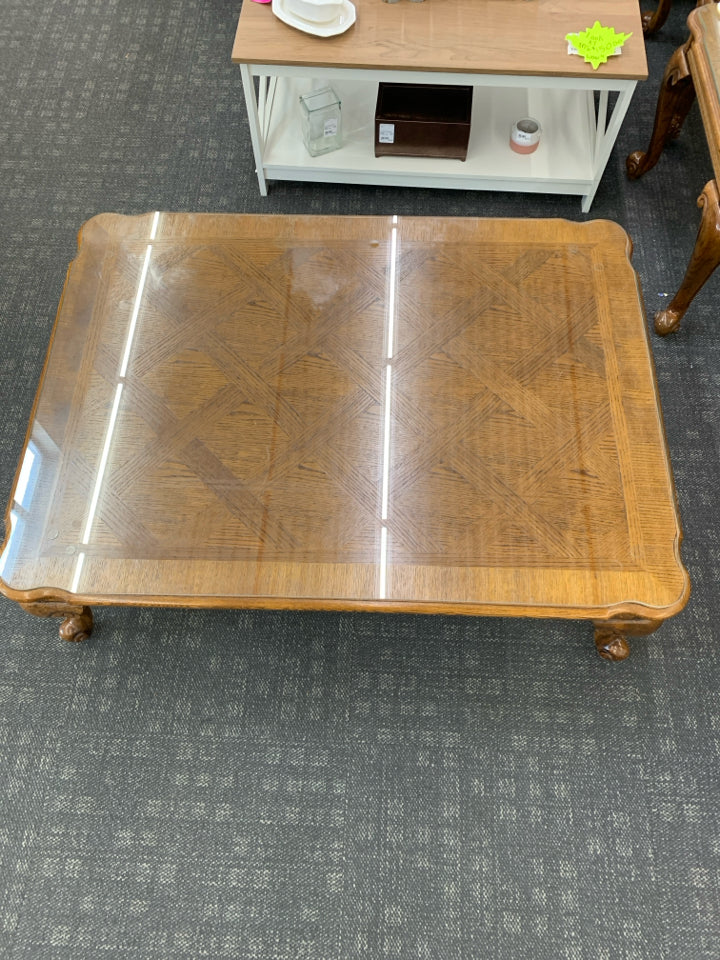MAPLE WOOD COFFEE TABLE W/ GLASS TOP.