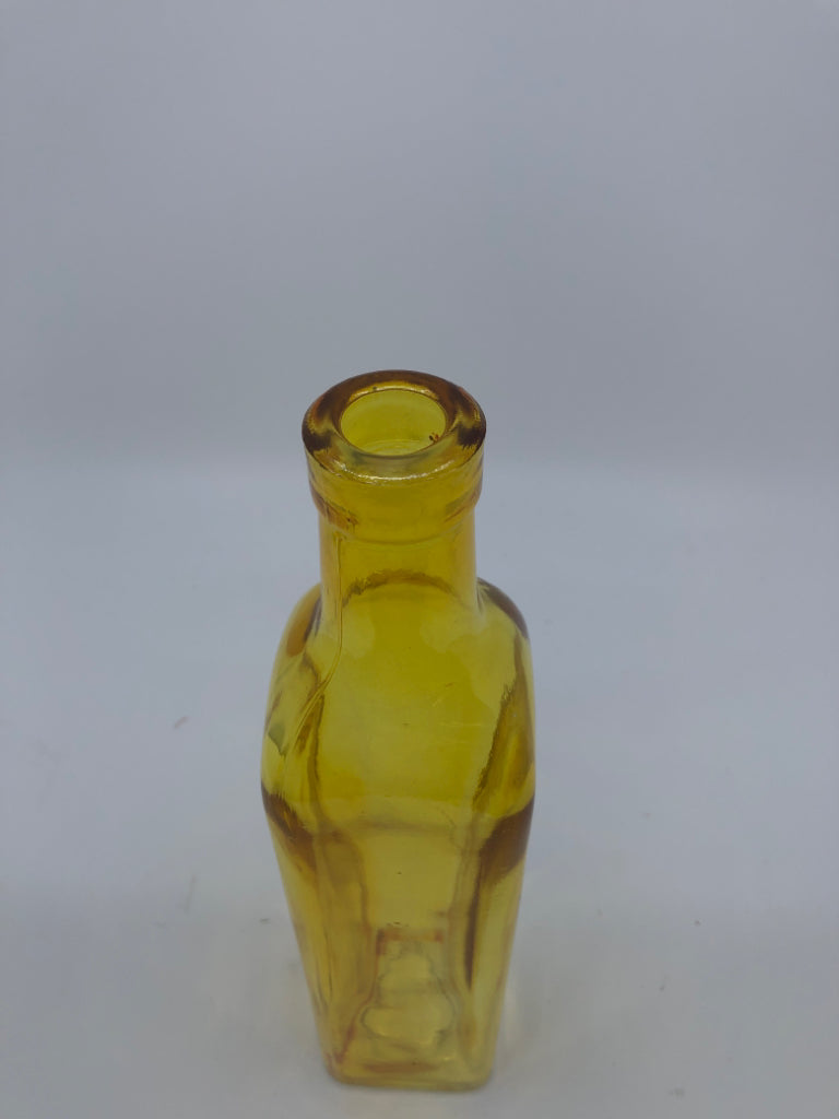 YELLOW GLASS BOTTLE.