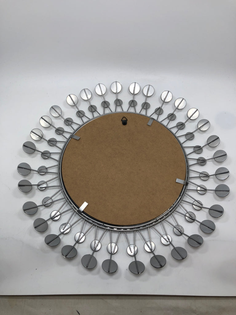 GEM-BURST MIRROR.