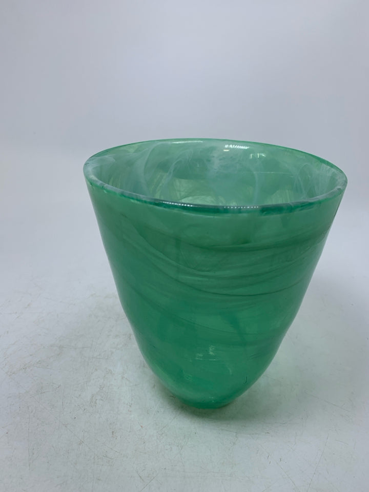 HEAVY GREEN GLASS VASE W/ WHITE SWIRL DETAILS.