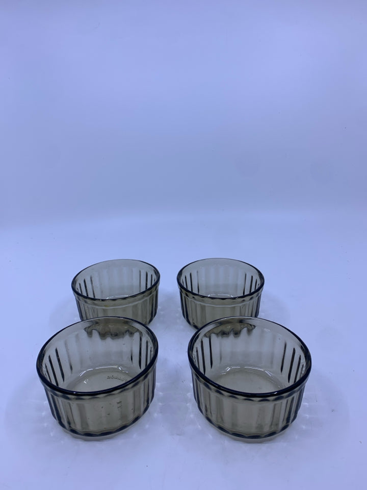 4 BROWN RIBBED GLASS SPICE BOWLS.