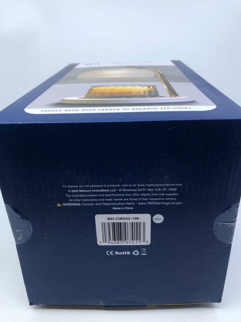 NIB CANDLE WARMER.