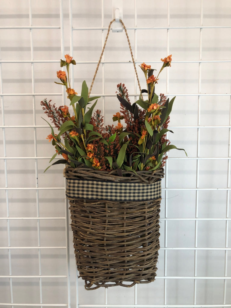 FAUX FALL FOLIAGE IN DRK BASKET WALL HANGING.