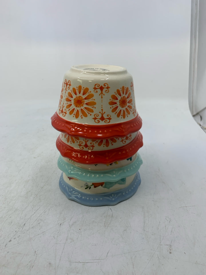 4 ASSORTED FLORAL SPICE BOWLS.