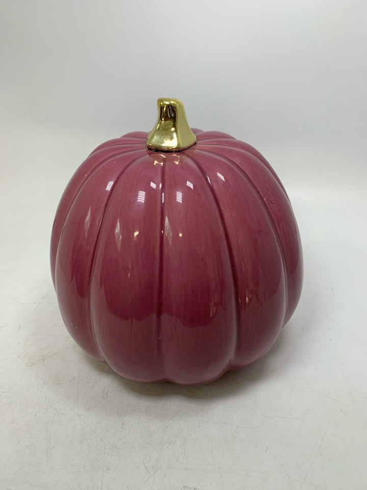 CERAMIC PURPLE PUMPKIN W/ GOLD STEM.