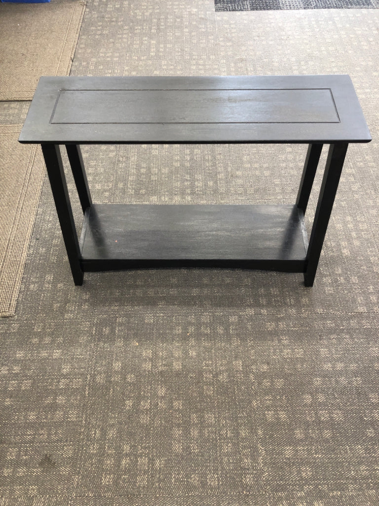 BLACK PAINTED WOOD CONSOLE TABLE.