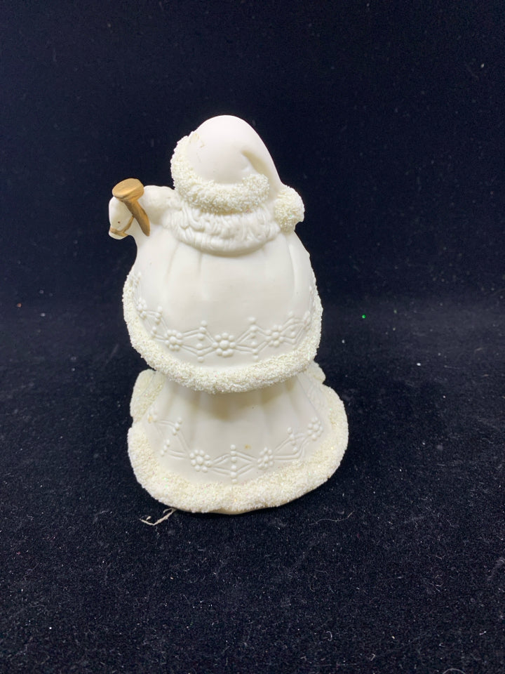 GOLD AND CREAM SANTA FIGURE.