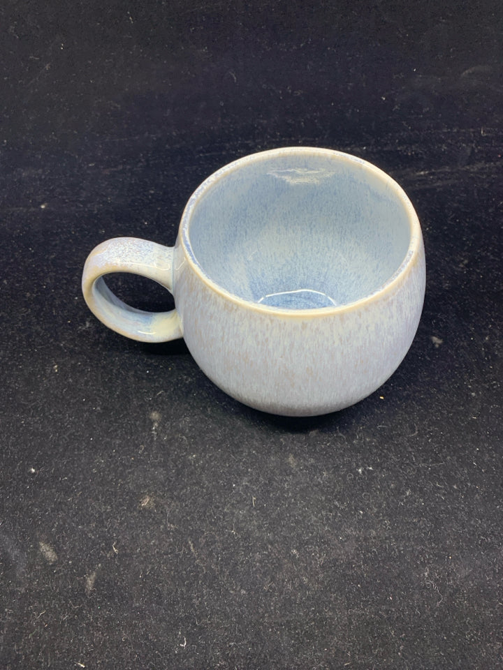 LIGHT BLUE POTTERY MUG.