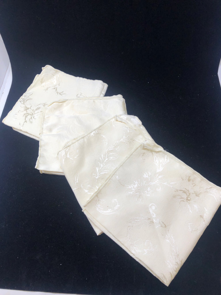 4 CREAM W SCROLL/FEATHER DAMASK NAPKINS.