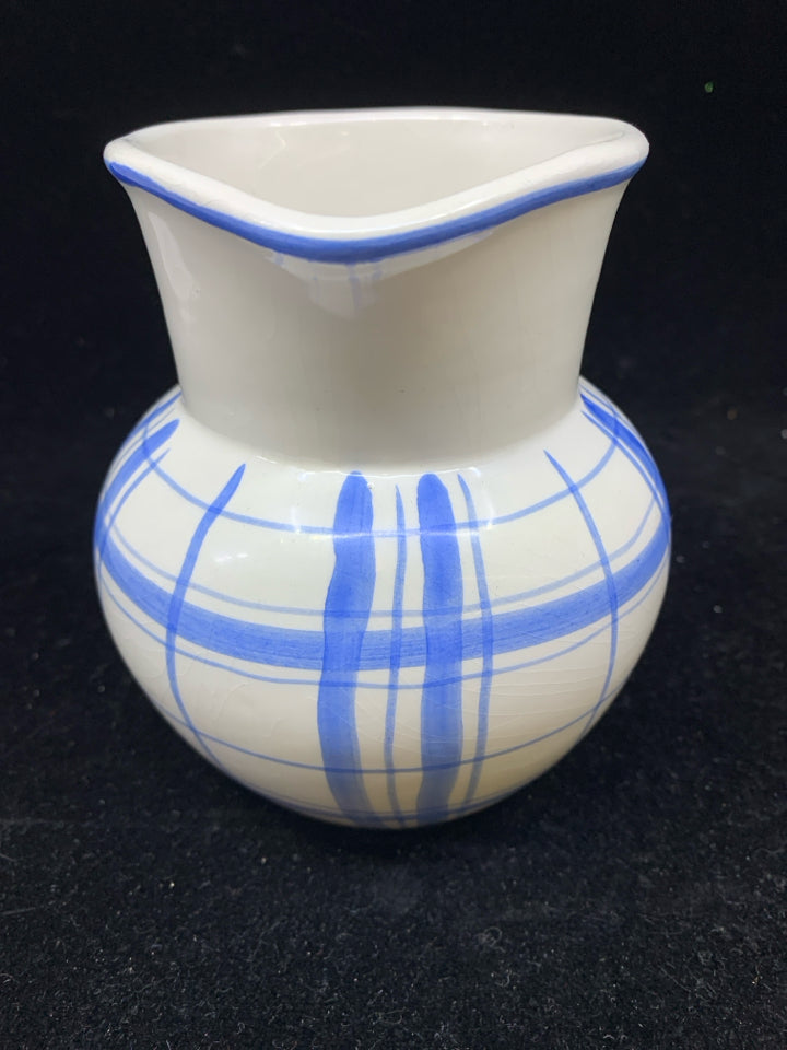 SMALL BLUE AND WHITE PITCHER.