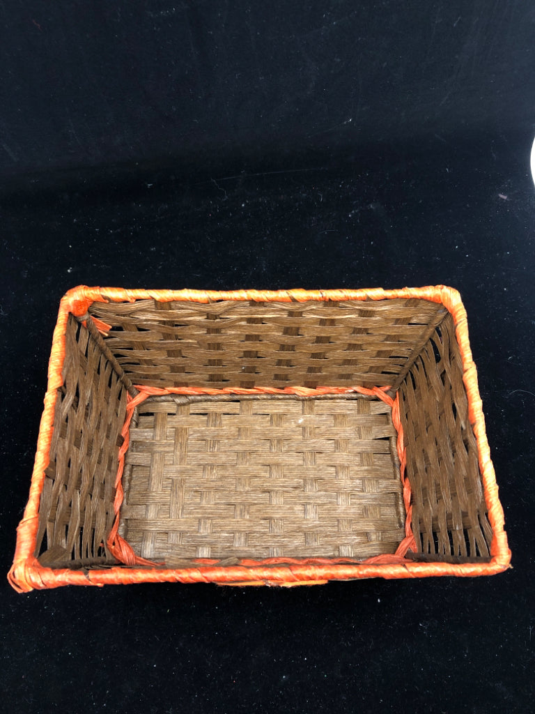 BROWN WOVEN BASKET W RED RIM.