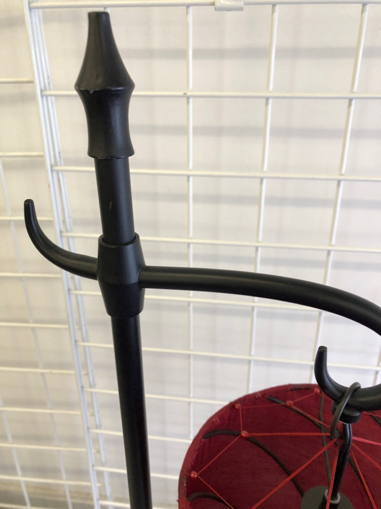 BLACK METAL BASE LAMP W/ RED SHADE/TASSEL.