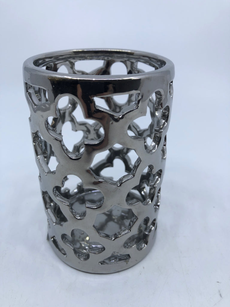 SILVER CUT CANDLE SLEEVE.