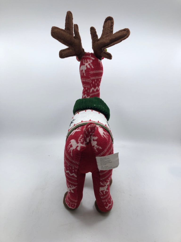 STANDING RED PLUSH REINDEER W/ GREEN COLLARS.