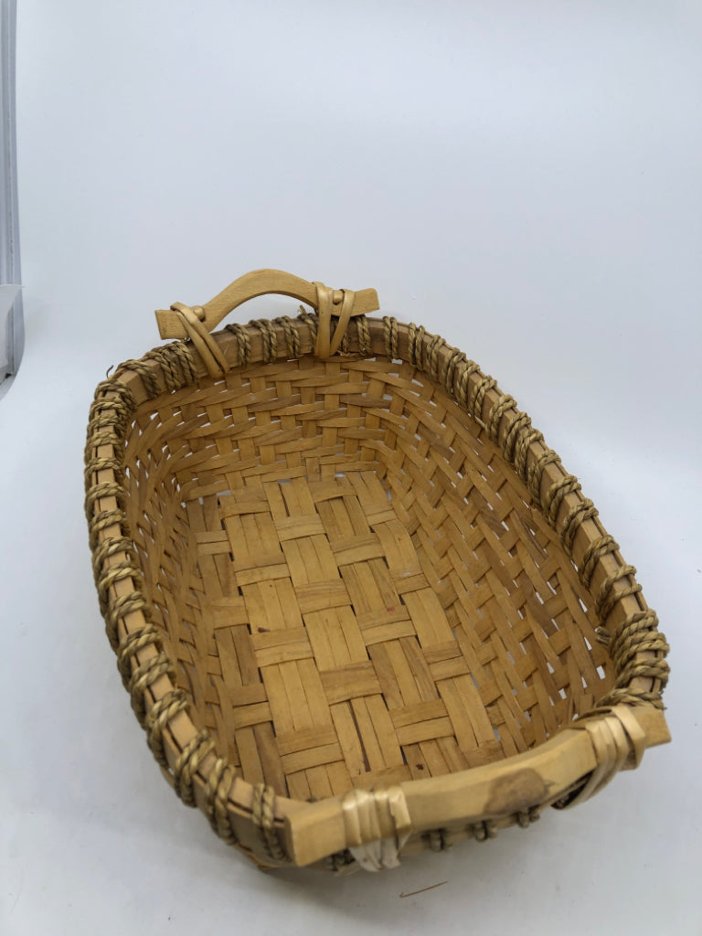 BLONDE WOVEN BASKET W WOOD HANDLES.