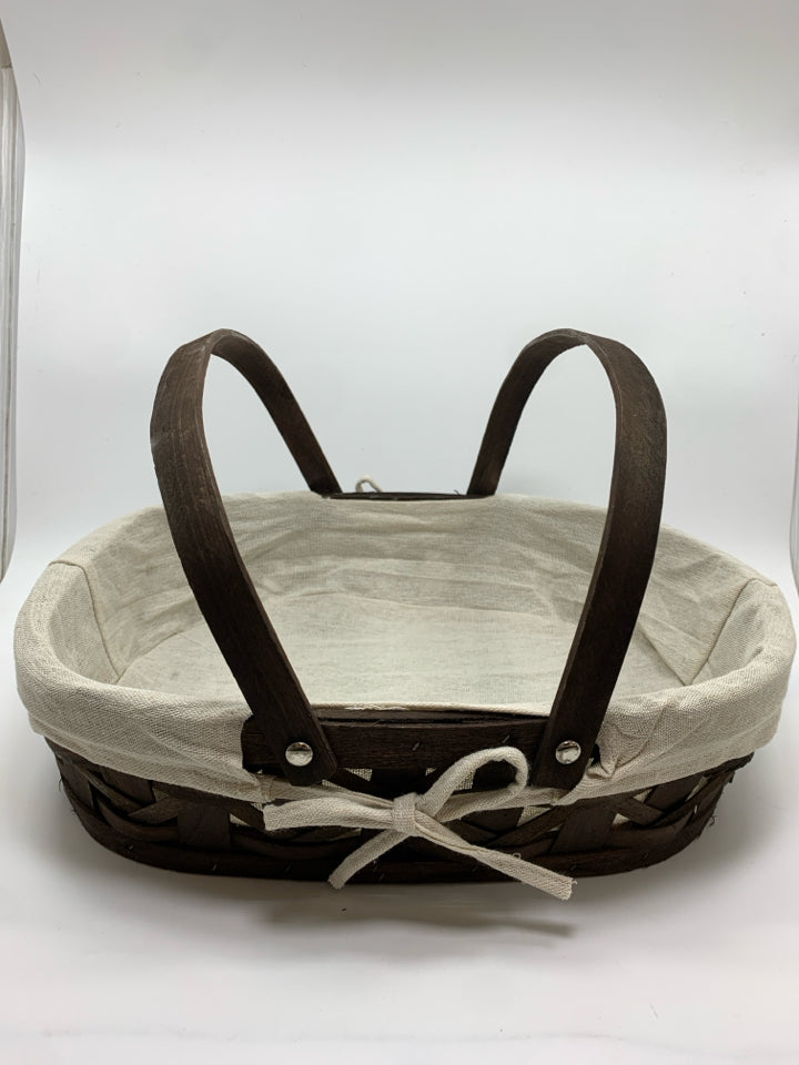 BROWN SHALLOW BASKET W/FABRIC LINING 2 HANDLES.
