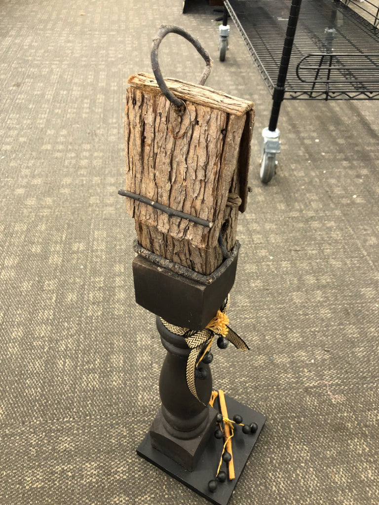 PRIMITIVE BIRDHOUSE ON POST W/BLACK BERRIES.