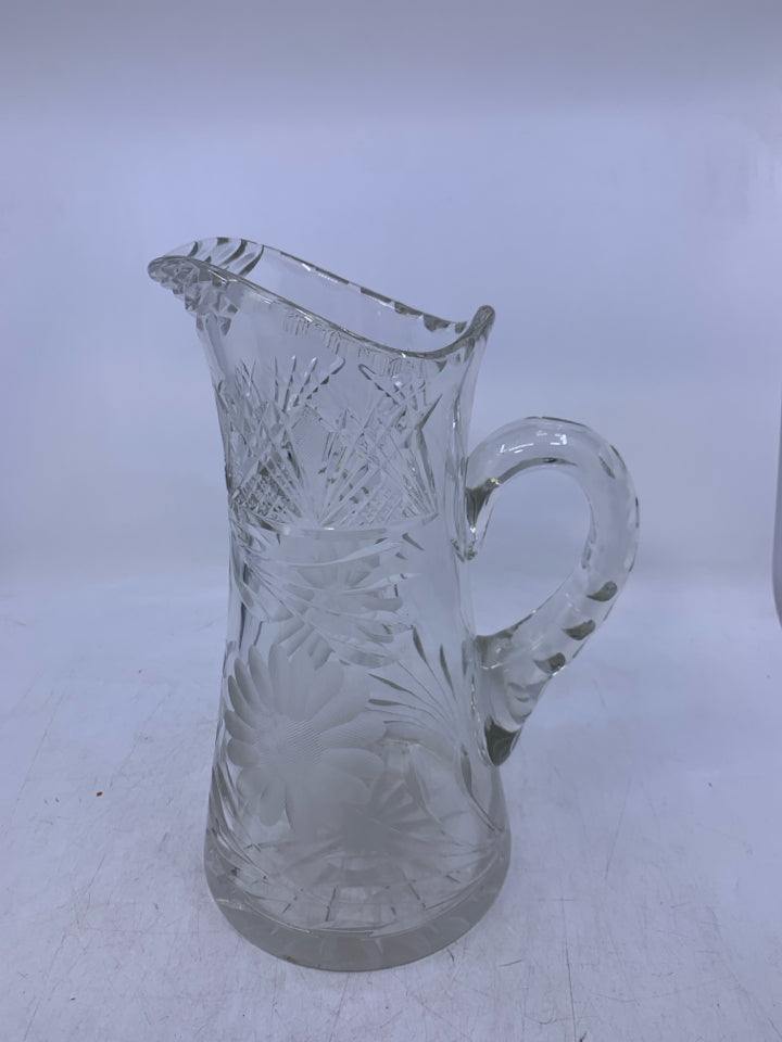 HEAVY GLASS LARGE PITCHER W/ ETCHED FLOWERS.