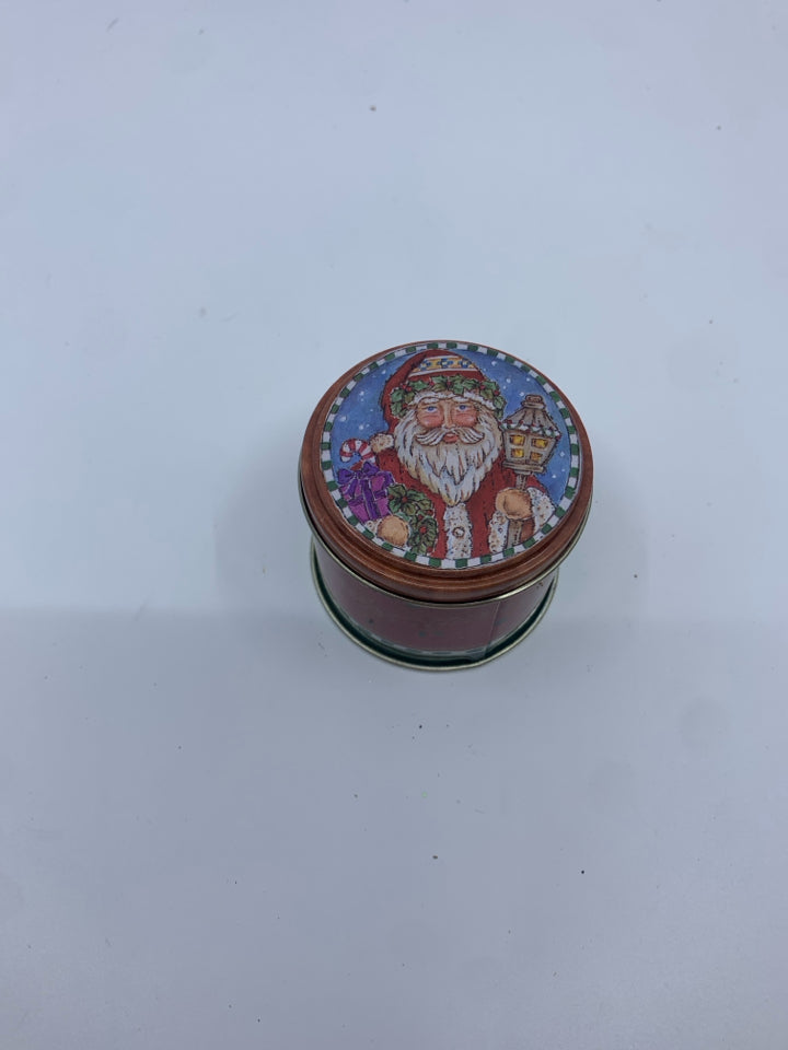 SMALL RED SANTA TIN CANDLE.