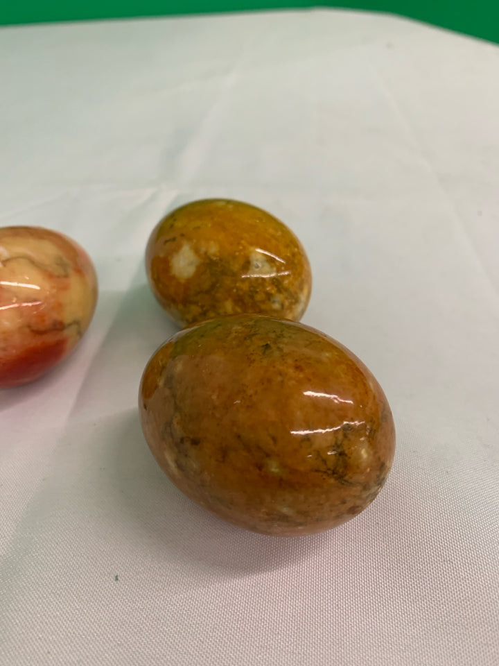 3 BROWN GLASS MARBLE EGGS.