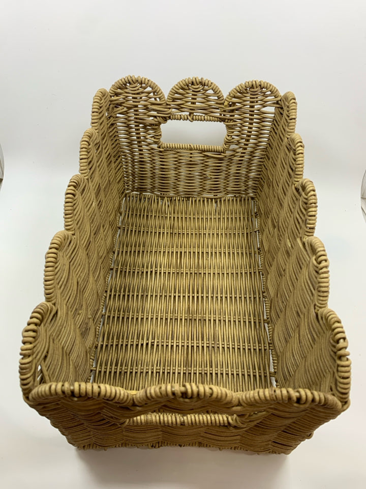 WOVEN BASKET W WAVY RIM AND HANDLES.